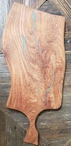 Cutting board with turquoise colored stone inlay